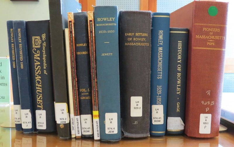 Photo of the spines of local history books on a shelf