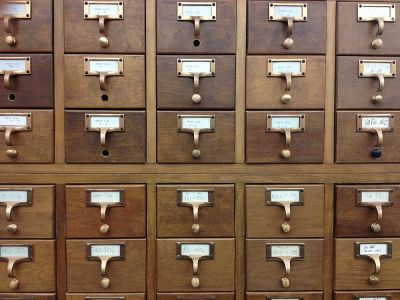 Photo of old wooden card catalog case